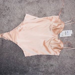 Pink satin bodysuit